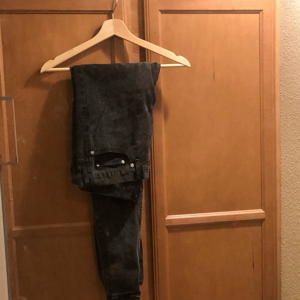 Dark washed skinny distressed jeans